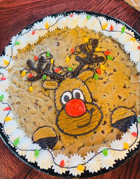 Rudolph cookie cake Christmas Cookie Cake Decorating Ideas, Christmas Cookie Cake Design, Christmas Cookie Cakes, Santa Cookie Cake, Large Cookie Cake, Frosted Animal Cookie Cake, Giant Cookie Cake Birthday, Decorated Big Cookie Cake, Rudolph Cookies