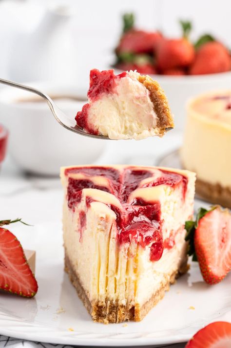 eating Strawberry Swirl Cheesecake Strawberry Swirl Cheesecake Recipe, 7 Inch Cheesecake Recipe, Eating Strawberry, Ultimate Cheesecake, Strawberry Swirl Cheesecake, Raspberry Swirl Cheesecake, Homemade Graham Cracker Crust, Swirl Cheesecake, Homemade Graham Crackers