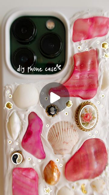 Courtney Michael on Instagram: "What I’d do differently if I made this again 👇🏻   Okay this is by far one of my favorite things I’ve made recently 🥹 I’ve been wanting to make a phone case like this and was SO excited when I found the pink shells and other little embellishments at a local vintage store!   BUT if I could make this again, I’d definitely use a thicker layer of caulking since a couple of the embellishments are a bit thicker. One of them was feeling a little loose so I took it off and glued it on with gorilla glue and it has stayed on really well since then. Overall I’m so happy with how it turned out and will probably go back to my local vintage store and see what other little gems I can find to make another one!   Lmk what you think! If you want to make one, the phone case, Beaded Shell Necklace As A Gift, Diy Shell Phone Case, Pink Shells, Make A Phone Case, Shell Iphone Case, Sea Shell Phone Case, Shell Phone, Gorilla Glue, Diy Phone Case