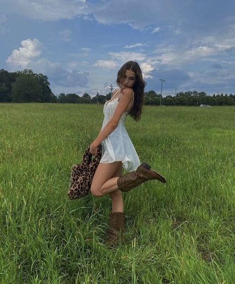 COASTAL COWGIRL — VANITY STORIES Picking Flowers Outfit, Cute Country Instagram Pictures, Country Outfits Women Aesthetic, Dress And Brown Cowboy Boots Outfit, Spring Outfits Cowboy Boots, White Dress With Brown Cowboy Boots, Latina Cowgirl Outfits Dress, Rainy Walk Outfit, Cowgirl Boots Outfit Brown