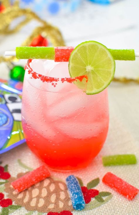 Sour Candy Margarita Mocktail Recipe Sour Candy Recipe, Margarita Mocktail Recipe, Kid Drinks Recipes, Margarita Mocktail, Drink Garnish, Sour Drink, Specialty Cocktails, Sour Belts, Candy Cocktails