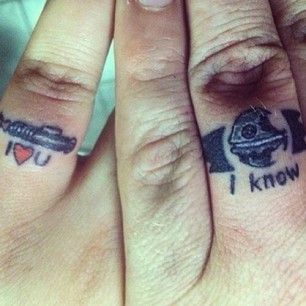 Go for these super awesome Star Wars-themed tats. | 33 Impossibly Sweet Wedding Ring Tattoo Ideas You'll Want To Say "I Do" To Star Wars Wedding Ring, Star Wars Ring, Ring Tattoo Designs, Couple Tattoos Love, Wedding Band Tattoo, Star Wars Couples, Tattoo Band, Ring Tattoo, Small Couple Tattoos