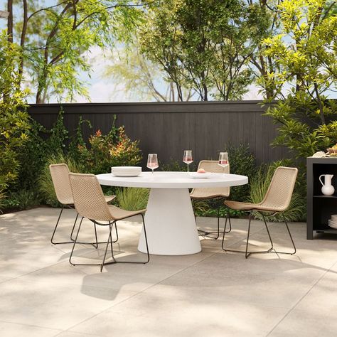 Concrete Indoor/Outdoor Pedestal Round Dining Table (32"–60") | West Elm West Elm Outdoor Dining, Round Concrete Dining Table, Modern Outdoor Dining Furniture, Outdoor Pedestal, Modern Outdoor Dining Table, Concrete Outdoor Table, Round Outdoor Table, Round Outdoor Dining Table, Round Patio Table