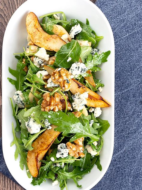 A pear and blue cheese salad is a classic autumn salad, this makes a perfect side dish, featuring seared pears, rocket (arugula) & walnuts Pear Blue Cheese Salad, Blue Cheese Salad Recipes, Pear And Blue Cheese Salad, Pear Blue Cheese, Entree Salads, Pear And Blue Cheese, Salad With Walnuts, Pear Salad Recipes, Blue Cheese Recipes