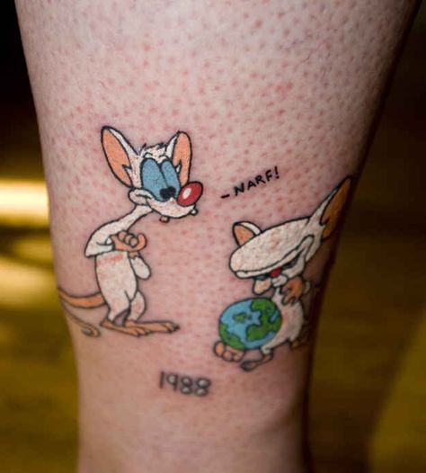 Does your tattoo plot to take over the world? | 21 Epically Nostalgic ’90s Cartoons As Tattoos Nostalgic 90s, Take Over The World, Inked Magazine, 90s Cartoons, 90s Cartoon, Cartoon Tattoos, Creative Tattoos, The Brain, Body Art