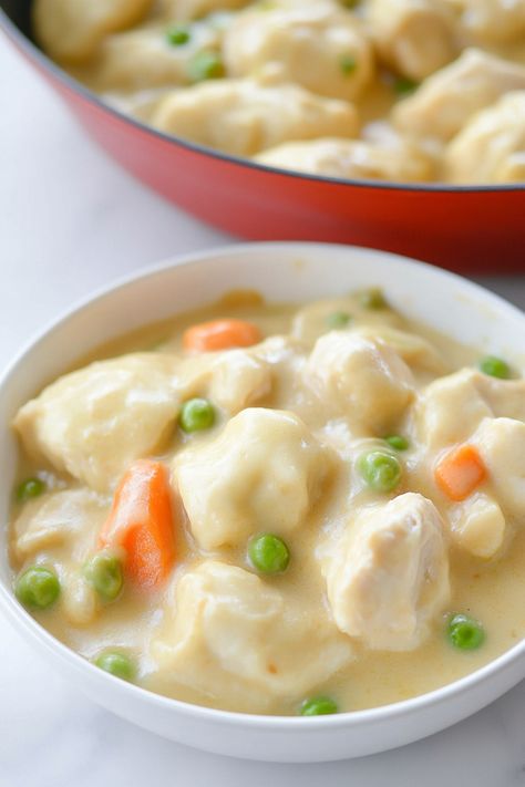 Indulge in a comforting bowl of creamy chicken soup with fluffy dumplings, perfect for cozy nights in or family gatherings. This classic recipe is easy to make and full of delicious flavors that will warm you from the inside out. Treat yourself to a taste of nostalgia with this hearty dish that brings everyone together around the table. Whether you're looking for a satisfying meal or simply craving some homemade goodness, cream of chicken soup with dumplings is sure to hit the spot every time. Chicken And Dumplings With Cream Of Chicken Soup, Creamy Chicken Dumpling Soup, Cream Chicken Soup Recipes, Easy Chicken And Dumpling Soup, Chicken Dumplings Soup, Chicken Soup With Dumplings, Chicken And Dumpling Soup, Soup With Dumplings, Turkey And Dumplings