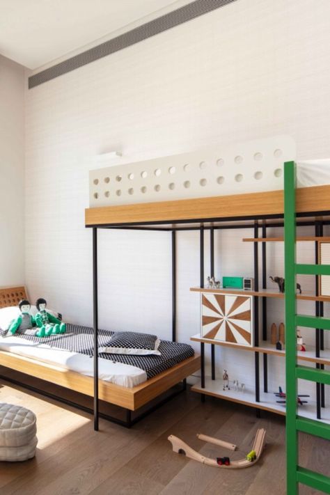 In Herzliya, a suburb of Tel Aviv, designer Sarit Shani Hay created a bedroom for young two boys aged three and six. The two beds, arranged at staggered heights, provide the benefits of a bunk bed while allowing storage space. Bedroom For Two Boys, Bedroom For Two, Colorful Nursery Decor, Two Boys, Made Furniture, Nursery Colors, Custom Made Furniture, Kids Corner, Bunk Bed