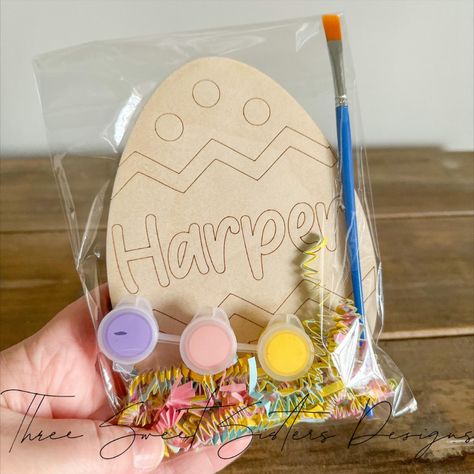 Personalized Easter Egg Paint Kits! 🎨🐰🥚🖌️
The eggs are laser engraved on 1/8” wood, and they measure 6” H x 4” W. 
They come packaged with 3 various colors of paint and a paint brush! 
There are 6 different designs to choose from. 
When ordering, please specify design choice and if you have paint color preferences 🎨
*Please note that the paints included are acrylic paints and are not washable* Easter Engraving Ideas, Painting Laser Engraved Wood, Wooden Easter Decor, Easter Glowforge Projects, Easter Laser Cut Ideas, Easter Lasercut Ideas, Easter Laser Ideas, Laser Engraving Ideas Acrylics, Cricut Projects Easter