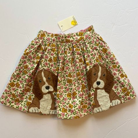 Nwt Mini Boden -- Is Your Mini Crazy About Puppies And Dogs? She'll Adore This Lovely Corduroy Floral Skirt With Two Sweet Spaniel Pups Appliqued On The Front. Beautiful Quality Appliques Are Done In Corduroy With Fluffy Sherpa Ears And Embroidered Accents. Gathered Skirt Has Two Big Pockets On Each Side Seam For Dog Treats Or Trinkets, An Elastic Waistband At Back, And Is Lined In Pretty Pink Fabric. Skirt And Lining Are Both 100% Cotton. Warm Machine Wash, Do Not Bleach, Tumble Dry Cold, Warm Gender Neutral Clothes, Fabric Skirt, Kids Clothing Brands, Two Sweet, Big Pockets, Gathered Skirt, Mini Boden, Pink Fabric, Pretty Pink