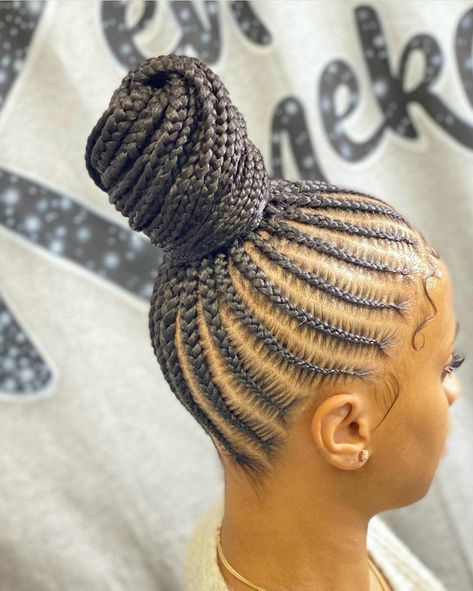 This braided top bun is a perfect go to style for the winter months. Follow our board Braided Crown for more styles like this. Cornrows Natural Hair, Black Kids Braids Hairstyles, Cornrow Ponytail, Braided Hairdo, Big Box Braids Hairstyles, Feed In Braids Hairstyles, Braided Styles, African Hair Braiding Styles, Braided Bun Hairstyles