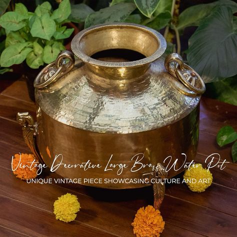 The Hand Crafted Vintage Decorative Large Brass Water Pot (Mataka) on Legs from Ambi a perfect blend of tradition and artistry, offering both functionality and timeless beauty to any home. Expertly handcrafted by skilled artisans, each brass mataka carries the legacy of generations. Its intricate design and craftsmanship reflect the dedication and skill passed down through the ages, making it a true work of art. Style your home with this exquisite vintage water pot. Its unique design and wa... Intricate Design, Timeless Beauty, Unique Vintage, Art Style, Unique Design, Hand Crafted, Unique Designs, Brass, Water