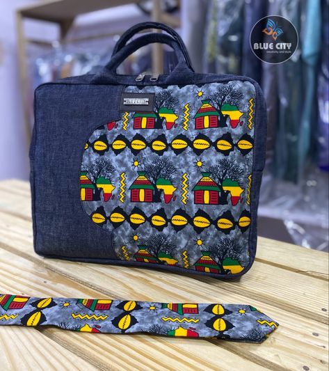 Made from beautiful african fabric, we made this beautiful unisex handbag/laptop bag with jeans to give you that fantastic touch. Comes in a size of 17 inches by 13 inches. Wholesale and retail available. Worldwide delivery #fashion #ankara #ankarabag #africanbag #handbag #jeansbag #ghana #africa #madeinghana #unisexbag #bluecity #unisexbag #bluecityfashion #bluecityfashiongh #bluecitygh Ankara Accessories, Handbag Laptop, Handbag Sewing, Ankara Bags, Handbag Sewing Patterns, Handmade Fabric Bags, African Bag, African Accessories, Luxury Bags Collection