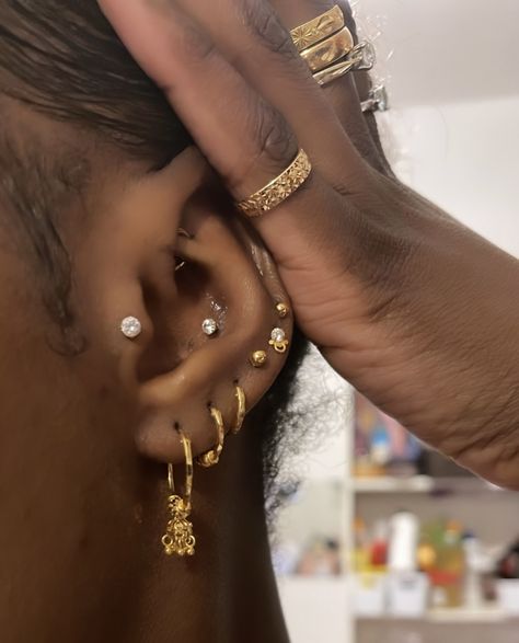 Angela Nakiyingi Ear piercing stack 😍 Beyonce Ear Piercing, Decorated Ears Piercings, Christina Piercing Placement, Pierced Ears Ideas, Best Ear Piercings, Ear Scape Ideas, Industrial Piercing Aesthetic, Ear Piercing Ideas Aesthetic, Ear Setup