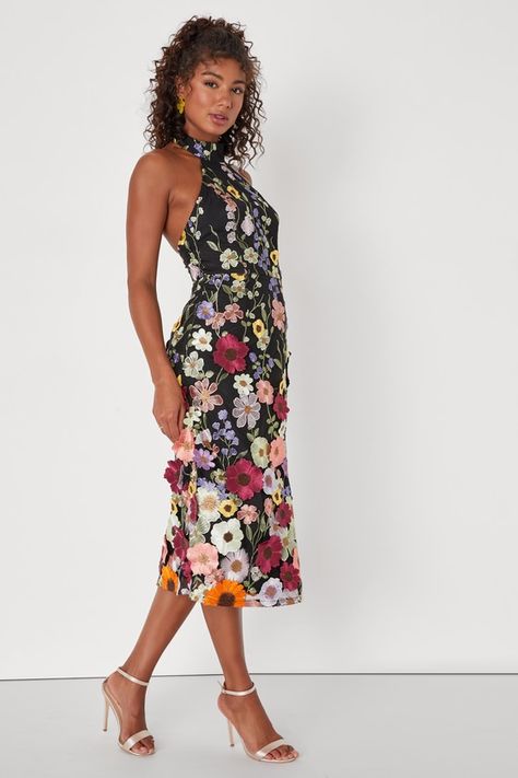 The Lulus Unique Impression Black 3D Floral Embroidered Halter Midi Dress will make you look even more beautiful than the first blooms of spring! This whimsical dress features an airy tulle overlay, decorated with an array of floral embroidery and floral applique details, some of which have a 3D effect at the edges. The halter neckline has loop-button closures at the back, atop a princess-seamed bodice with an alluring open-back design. Fitted waist tops a figure-skimming column skirt that finis Midi Dress Wedding Guest, Floral Applique Dress, Whimsical Dress, Column Skirt, Midi Dress Formal, Latest Fashion Dresses, Halter Midi Dress, Halterneck Dress, Lulu Dresses