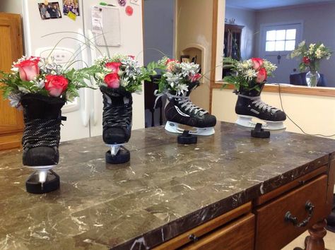 Hockey flower decorations Hockey Centerpieces, Hockey Diy, Hockey Wedding, Hockey Birthday Parties, Hockey Crafts, Banquet Centerpieces, Hockey Tournaments, Hockey Decor, Hockey Room