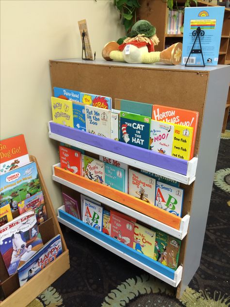 Library makeover. Have books facing out. Bookshelf Makeover Diy, Daycare Center Ideas, Library Makeover, Kindergarten Library, Reading Corner Classroom, Learning Centers Preschool, Bookshelf Makeover, Daycare Design, Sunday School Classroom