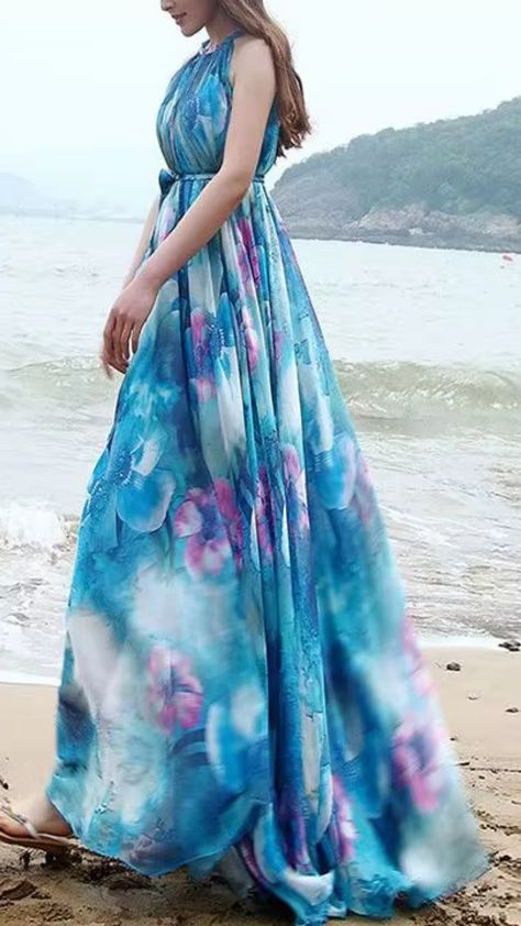 I saw this stunning Floral Bohemian Beach Chiffon Sexy Strap Sleeveless Maxi Dress, and I can't get over how perfect it is for summer!   The flowy fabric and vibrant floral print just scream beach vibes. I can already imagine wearing it to a seaside picnic or a sunset stroll.   What do you think? Would you rock this dress? Let me know in the comments! 🌺👗✨   #SummerStyle #BohoChic #MaxiDress #FashionInspo #BeachVibes Seaside Picnic, Full Gown, Bohemian Maxi, Flowy Fabric, Bohemian Maxi Dress, Bohemian Beach, Beach Vibes, You Rock, Sleeveless Maxi Dress