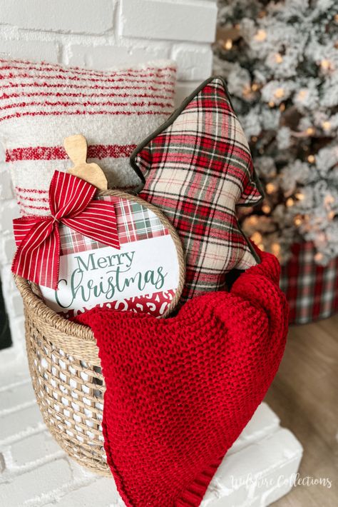 Cozy Christmas decorating ideas Pillow In Basket Decor, Christmas Decor Basket Ideas, Christmas Blanket Basket Decor, Wicker Basket Christmas Decor, Decorating A Basket For Christmas, Christmas Basket Decoration Ideas, Christmas Basket Decor, Basket Christmas Decor, Wilshire Collections