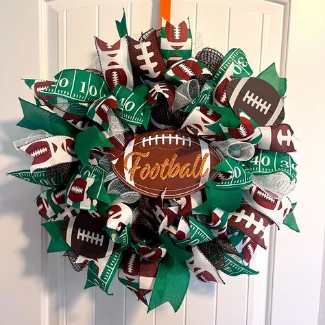 It’s Football Season!!! Show Ur Neighbors How Much You Like Football. Front Door Football Wreath Made With Mesh And Football Themed Ribbon. It’s Nice And Full. Measures About 22 Inches Across. Football Wreaths For Front Door, Football Wreath Diy, Football Wreaths, Sports Wreaths, Football Wreath, Scentsy Bars, West Highland Terrier, Girls Handmade, Bud Light