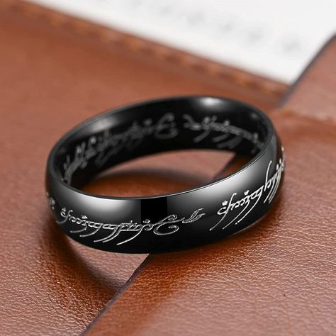 New! Hobbit Lord Of The Rings Black Elvish Rune Engraving Ring Details: - Condition: New - Color: Black - Material: Titanium Steel - Included: 1 X Ring Check Out My Other Listings! Other Items I Carry: Vintage Rings Retro Rings Men's Rings Sterling Silver Rings Engagement Bridal Wedding Rings Punk Biker Rings Ethnic Rings Floral Rings Pearl Rings Art Deco Rings Gothic Rings Couples Rings Ring Sets Heart Rings Funny Rings Silver Necklaces Gold Necklaces Vintage Necklaces And Earrings Handmade Jewelry Opal Rings Bracelets And Necklaces And Tons Of Popular Trendy Jewelry Deals. Black And Silver Rings For Men, Dnd Wedding Ring, Christian Rings For Men, Lord Of The Rings Wedding Band, Funny Rings, Silver Rings Engagement, Rings Gothic, Retro Rings, Engraving Ring