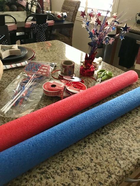 Last year I made some wooden firecrackers for July 4th, and this year I wanted to make something a bit different. I was at the Dollar Store and saw some pool noodles and came up with this idea. #diy #fourth of july #july #america #patriotic #diy decor Diy Dishwasher Tablets, Wooden Firecrackers, Golf Cart Decorations, Farmhouse Style Wreath, Crafty Decor, 4th July Crafts, Fourth Of July Decor, July Decor, Diy Pool