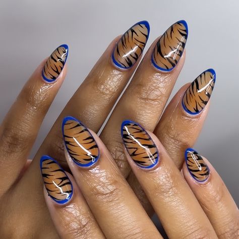 🐅🐅 inspo @nailsxanalysse • • • #nailzzbylo #nails #nailsnailsnails #nailsofinstagram #nailart #naildesign #nailinspiration #nailinspo #nailideas #gelxnails #acrylicnails #structuredmani #fallnails #nailtech #nailsoftheday #nailsofig #nailstagram #covinanailtech #2024nails #sandimasnails #626nails #zebranails Blue Tiger Nails, Zebra Design Nails, Tiger Nails Designs, Blue Zebra Nails, Epic Nails, Fun Fits, Tiger Nails, Zebra Nails, Nails Blue