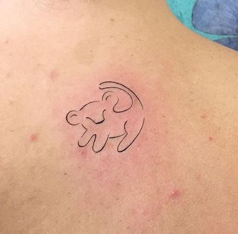 Minimal Disney Tattoo Ideas, Lion King Inspired Tattoos, Small Animal Tattoos For Women Simple, Tarsier Tattoo, Small Lion King Tattoo, Simba Tattoo Lion King, Lion King Tattoo For Women, Cars Tattoo Disney, The Lion King Tattoo