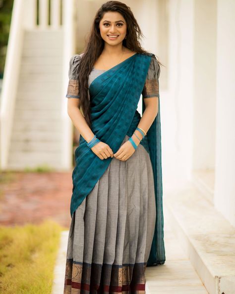 Delna Davis in peacock blue cotton half saree - South Indian Actress Delna Davis, Dark Peacock Blue, Silk Half Saree, Silk Lehenga Choli, Lehenga Choli For Women, Simple Lehenga, Lehenga Saree Design, Choli For Women, Cotton Blouse Design