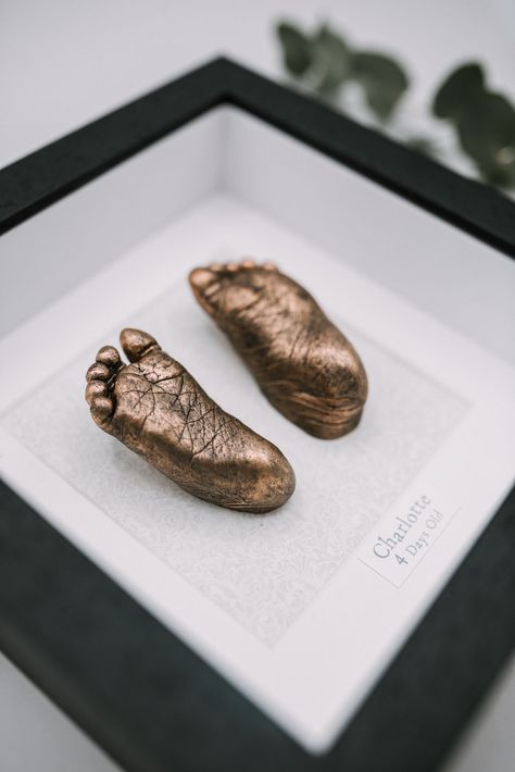 Tiny new born baby feet casts in black frame finished in copper.  Photo - Bailey & Roo Baby Hand Casting, Baby Casting Frame, Baby Casting Ideas, Hand Casting, Baby Casting Kit, Baby Imprint, Baby Hand And Foot Prints, Baby Handprint Crafts, Baby Cast