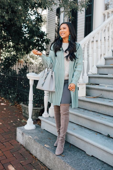 Blogger Hoang-Kim shares how to style a mint green cardigan with over-the-knee boots Seafoam Green Cardigan Outfit, Mint Green Sweater Outfit Winter, Mint Green Cardigan Outfit, Mint Cardigan Outfit, Mint Green Sweater Outfit, Mint Sweater Outfit, Green Cardigan Outfit, Fall Weather Outfits, Green Sweater Outfit