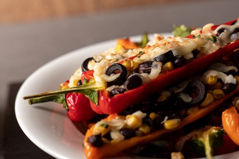 A simple chef-inspired twist on roasted stuffed peppers, featuring savory Aurora Long Sweet Peppers. Explore the southern flavors tonight for dinner. Roasted Stuffed Peppers, Black Bean Corn, Olive Relish, Sweet Peppers, Chef Inspiration, Stuffed Sweet Peppers, Black Bean, Gluten Free Vegetarian, Healthy Foods