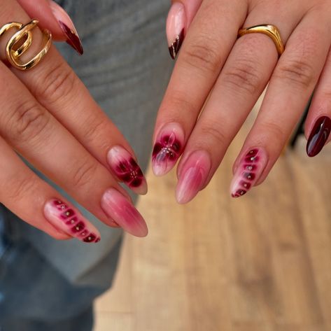 it girl nails 🐆 deep cherry mix and match nails for aleena. always grab an outfit shot on her way out because i trust she’s planned the nails to coordinate lol I keep saying this, but definitely my favourite set I’ve ever done (so far? lmao) builder gel nails + one extension ☝🏻 this combo of aura, flowers, blooming gel, french + glitter was absolutely lovely to create and although I went a bit non verbal while working out the steps I’m absolutely in love with it 🤣 i’m cait, a colchester ... Bloom Nails Art, Blooming Gel Aura Nails, Blooming Gel Flowers, Blooming Gel Flower, Builder Gel Nails Design, It Girl Nails, Mix And Match Nails, Blooming Gel Nails, Blooming Gel Nail Art