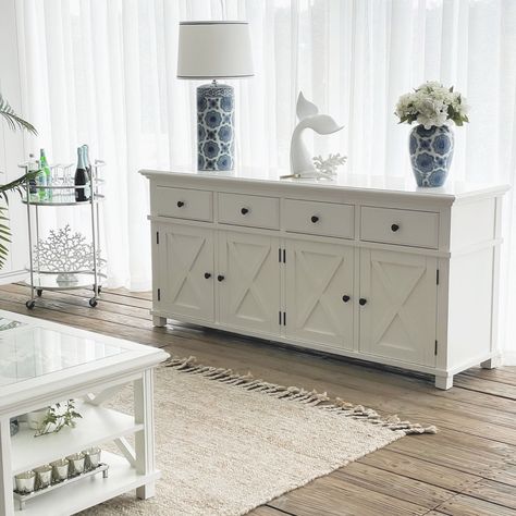 The Sorrento 4 door Buffet in crisp white, is a classic combination of classic and contemporary style. A sound structural design is completed with cross detailing for a look that is well suited to the modern home. Featuring ample storage, the Sorrento buffet combines four drawers and four cupboards providing perfect storage for a living or dining space. 🤍 Available now to pre order 🤍 Blue Ceramic Lamp, Buffet Furniture, Apartment Lobby, Wood Assembly, Structural Design, Black Sideboard, Concrete Furniture, White Sideboard, Hamptons Style