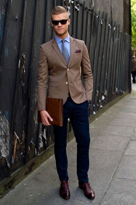 navy trousers, a brown blazer, a shirt and a tie, burgundy shoes Chinos And Blazer, Stil Masculin, Don Pedro, A Man In A Suit, Man In A Suit, Dress Shirt And Tie, Wedding Sparklers, Brown Blazer, Cocktail Attire