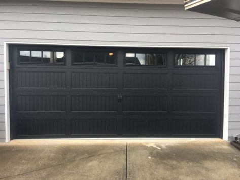 Black Garage Doors Are Trendy Black Garage Door, Black Garage Doors, Garage Door Colors, Double Garage Door, Carriage House Garage Doors, Garage Door House, Carriage House Doors, Carriage Garage Doors, Black Garage