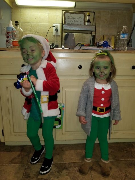 Dr seus toddler grinch.  For my daughter I just used her Mrs claus pj  shirt and my son  had a Santa suit from last Christmas.  Tights and body paint were from party city. Easy, cheap, and a big hit at school Grinch Day At School Outfit Boys, Grinch Day At School Outfit, Grinch Day At School, Grinch Day, Christmas Tights, Half Up Half Down Short Hair, Toddler Tights, Boys School Outfits, Grinch Party