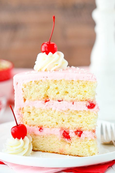 Cherry Almond Layer Cake - a light almond cake, cherry frosting and bits of cherry between the cake layers! So good! Almond Layer Cake, Cherry Chip Cake, Cherry And Almond Cake, Cherry Frosting, Cherry Cake Recipe, Fruit Dips, Cake Cherry, Bolo Vintage, Almond Cake Recipe