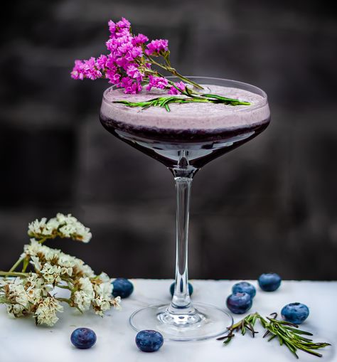 Let’s celebrate summer’s bounty by pairing Blueberry and Rosemary that complement each other perfectly. Combining the flavours of an aromatic herb with the delicate sweet flavours of a berry is not uncommon. Therefore, we decided to pair Blueberries and Rosemary for our next cocktail. Blueberries are extremely versatile berries that work with almost all herbs. Pairing it with savoury rosemary is like a match made in heaven. Amaro Cocktails, Blueberry Gin, Vermouth Cocktail, Gin Sour, Glazed Pork Chops, Parmesan Cream Sauce, Sloe Gin, Lemon Rosemary, Fancy Cocktails