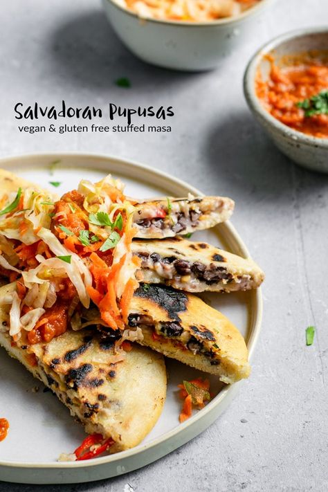 These homemade pupusas are a classic Salvadoran recipe, stuffed with black beans and vegan cheese and topped with curtido and salsa roja. #thecuriouschickpea #vegan #glutenfree #blackbeans #pupusas #salvadoran #masa #vegansnack #veganappetizer #veganentree Black Bean Pupusas, Papusa Recipe Vegan, Tofu Queso, Vegan Pupusas, Homemade Pupusas, Salvadoran Pupusas, Pupusa Recipe, Traditional Spanish Recipes, Fermented Cabbage