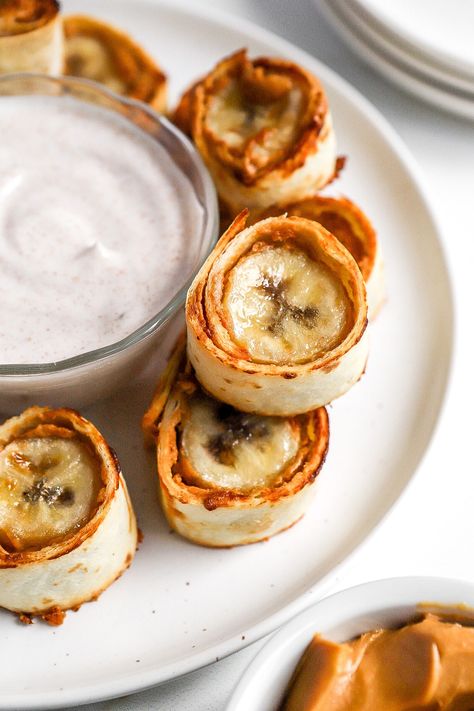 Air Fryer Banana Tortilla Roll Ups (Easy Recipe) Air Fryer Banana, High Protein Yogurt, Banana Roll, Tortilla Rolls, Protein Yogurt, Gluten Free Tortillas, Peanut Butter Roll, Fried Bananas, Roll Ups Tortilla