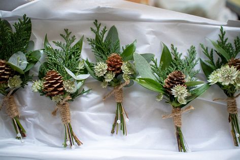 Pine Cone Boutineer Ideas, Blue Thistle Boutonniere, December Wedding Flowers, Pinecone Bouquet, Thistle Boutonniere, Pine Cone Wedding, Plant Centerpieces, Mini Pine Cones, Italian Ruscus