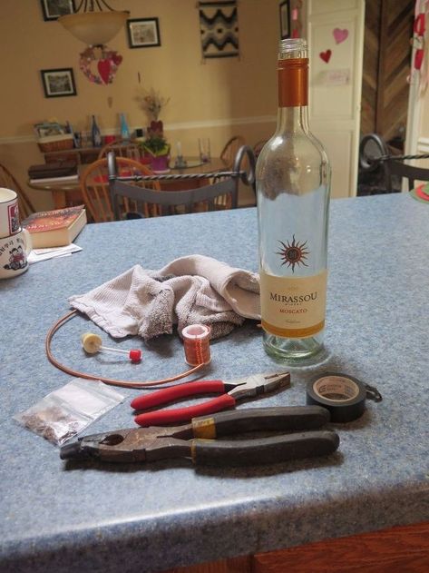 Turn Your Wine Bottle Into A Beautiful Copper Wire Hummingbird Feeder | Hometalk Wire Hummingbird, Bottle Upcycle, Diy Hummingbird Feeder, Copper Wire Crafts, Hometalk Diy, Bottles Diy, Upcycle Diy, Empty Glass Bottles, Empty Wine Bottles