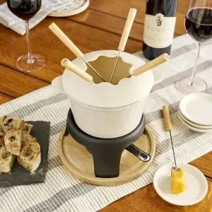 Transform your gatherings with the Enamel Cast Iron Cookware Chocolate Cheese Fondue Set. Perfect for both chocolate and cheese fondues, this set offers a delightful way to enjoy rich, melted goodness with friends and family. The enamel coating ensures even heat distribution and easy cleaning, while the sturdy cast iron construction provides excellent heat retention 
#FondueSet #EnamelCastIronCookware #ChocolateFondue #CheeseFondue #EntertainingEssentials #HeatRetention Cast Iron Fondue, Cheese Melting, Fondue Forks, Fondue Party, Enameled Cast Iron Cookware, Enamel Cookware, Kitchen Cookware Sets, Fondue Pot, Cast Iron Pot