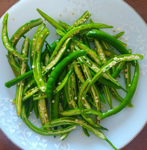 Green Chilli Fry (Hari Mirchi Fry) Recipe Kichiri Recipe Indian, Hatch Green Chilli Recipes, Mirchi Fry Recipe, Bharwa Mirchi Recipe, Ennai Kathirikai Kulambu, Mustard Oil, Coriander Powder, Everyday Dishes, Chaat Masala