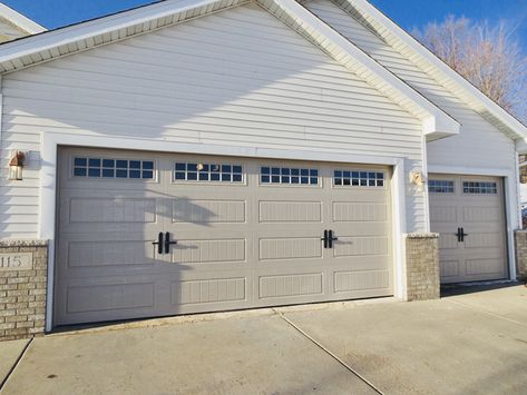 Amarr Hillcrest 3000 in Sandtone with Long Panel Bead Board Panels and Stockton Windows. Installed by Augusta Garage Door in St. Cloud, MN. #garagedoors #garagedoor #steelgaragedoor #carriagehousedoor #amarrgaragedoors Faux Garage Door Windows, Garage Door Update, Faux Wood Garage Door, Carriage House Garage Doors, Garage Door Colors, Double Garage Door, Garage Door House, Craftsman Garage Door, Single Garage Door