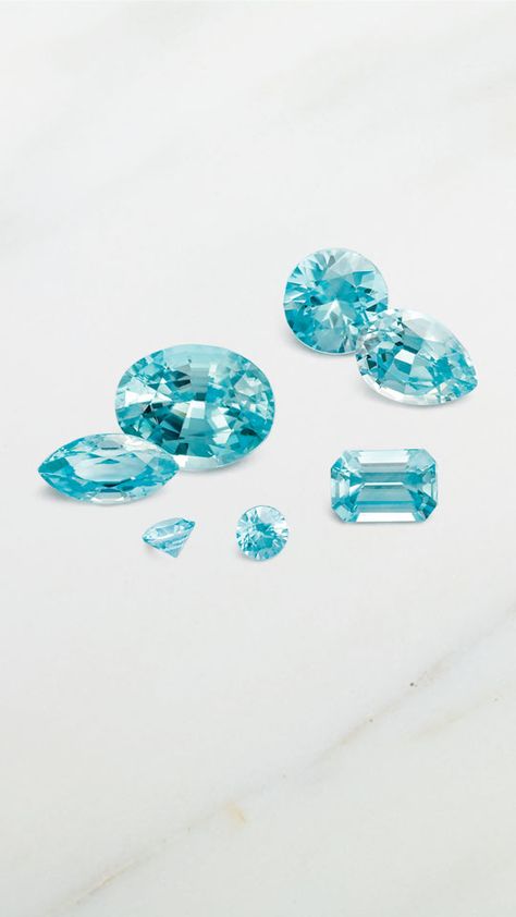 Blue zircon combines a gorgeous teal color with fiery brilliance akin to diamonds. In fact, for centuries, people confused colorless zircon with diamond. 💙💎  Learn more about blue zircon, one of December's three blue birthstones, on the blog today! Under The Never Sky, All Things Blue, Jewelry Clothes, Gemstones Crystals, Gems Crystals, Colored Gems, Blue Zircon, Teal Color, Design Board