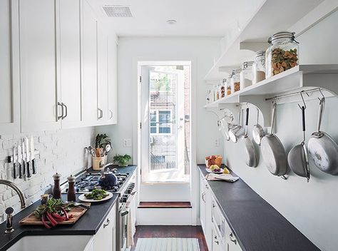 Credit: Matthew Williams Thanks to a knocked-through, raised ceiling, this narrow galley kitchen in Brooklyn, New York, feels a lot larger t... White Galley Kitchens, Kitchen Galley, Small Galley Kitchen, Model Dapur, Galley Kitchen Design, Galley Kitchen Remodel, Galley Kitchens, Narrow Kitchen, Kabinet Dapur