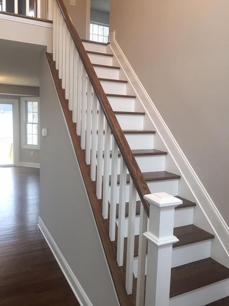 Dark walnut stained staircase and hardwood floors Under Stairs Kitchen, Stained Staircase, Paradise Aesthetic, Stair Railing Makeover, Modern Staircase Design, Staircase Design Ideas, Stairs In Kitchen, Stair Design, Hardwood Stairs