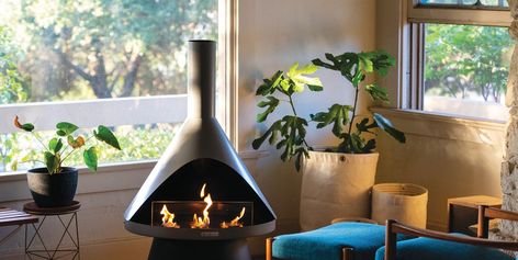 After Using This Smokeless Fireplace I Don't See the Point of a Real One https://trib.al/4cXcGxM Smokeless Fireplace, Modern Electric Fires, Indoor Outdoor Fireplace, Mid Century Fireplace, Malm Fireplace, Solo Stove, Indoor Outdoor Fireplaces, Ventless Fireplace, Cool Fire Pits