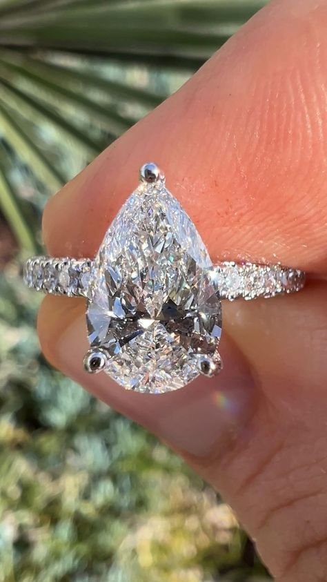 A vision of elegance and sophistication! 💍✨ Witness the grace of a 1.50 carat pear diamond adorned with a 3D diamond band and a hidden halo. | Instagram Pear Shaped Ring With Wedding Band, Pear Wedding Ring, Dream Wedding Ring, Pretty Engagement Rings, Wedding Rings Princess Cut, 3d Diamond, Ring Inspo, Rings Ideas, Pear Shaped Ring